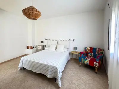 Letto o letti in una camera di Casa Storica