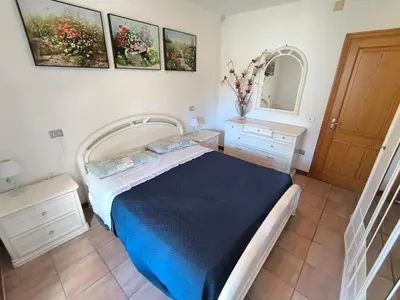 Letto o letti in una camera di Casa Vacanze Bue Marino