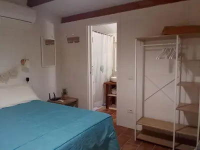Letto o letti in una camera di Camere DomusAntiga wifi