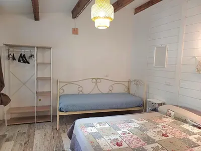 Letto o letti in una camera di Camere DomusAntiga wifi