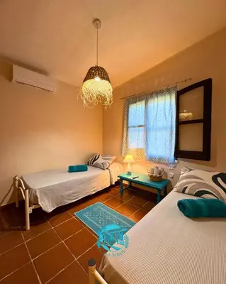 Letto o letti in una camera di Casa Antele