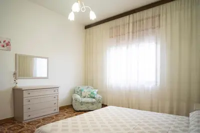 Letto o letti in una camera di Casa L'Iris