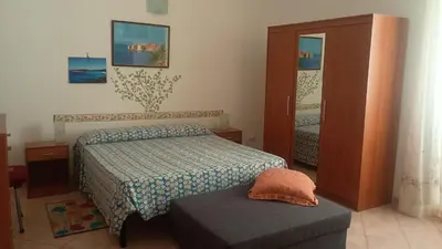 Letto o letti in una camera di La Maison