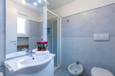 Bagno di Villa Cala Pira sul mare con Wi-Fi