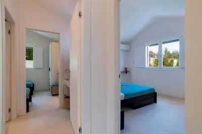 Letto o letti in una camera di CASA MOROS 6, Emma Villas
