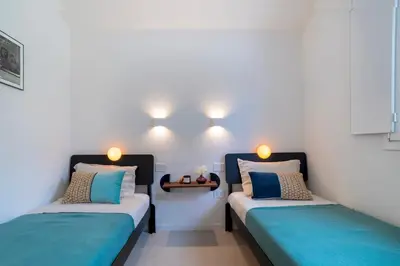Letto o letti in una camera di CASA MOROS 6, Emma Villas