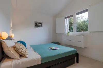 Letto o letti in una camera di CASA MOROS 6, Emma Villas