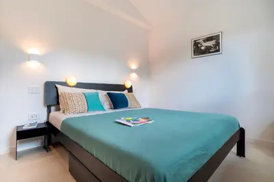 Letto o letti in una camera di CASA MOROS 6, Emma Villas