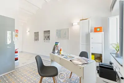 TV o dispositivi per l'intrattenimento presso Rosa dei Venti Guesthouse