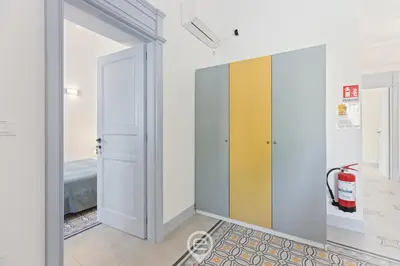 Letto o letti in una camera di Rosa dei Venti Guesthouse