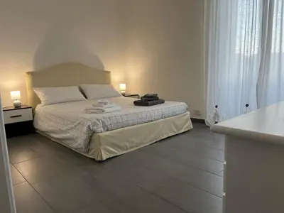 Letto o letti in una camera di Sunny House, Piazza Repubblica
