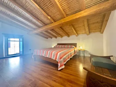 Letto o letti in una camera di Casa Monte Grappa
