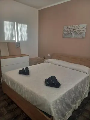 Letto o letti in una camera di La Perla Marina