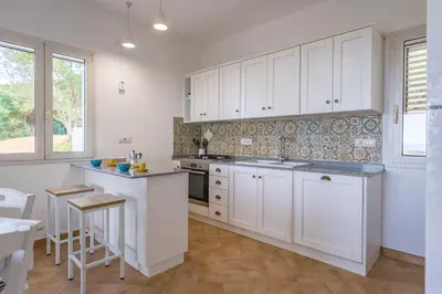 Cucina o angolo cottura di Il Mirto - Affitti Brevi Italia