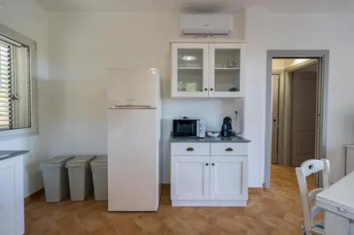 Cucina o angolo cottura di Il Mirto - Affitti Brevi Italia