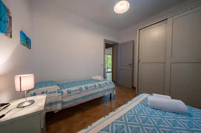 Letto o letti in una camera di Il Mirto - Affitti Brevi Italia