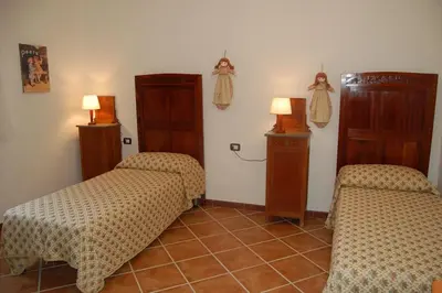 Letto o letti in una camera di Rustico in campagna a pochi minuti dal mare