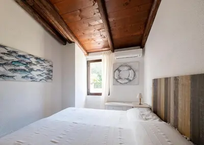 Letto o letti in una camera di Casa Linda 100m from the beach