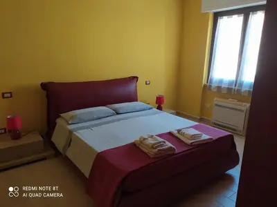 Letto o letti in una camera di Appartamento per brevi periodi
