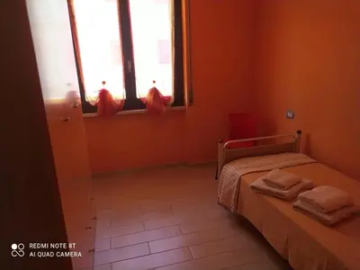 Letto o letti in una camera di Appartamento per brevi periodi