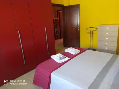 Letto o letti in una camera di Appartamento per brevi periodi