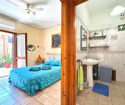 Letto o letti in una camera di Casa Giò