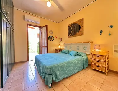 Letto o letti in una camera di Casa Giò