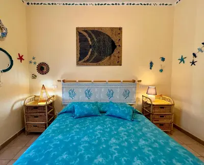Letto o letti in una camera di Casa Giò