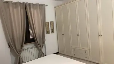 Letto o letti in una camera di Villa Emma