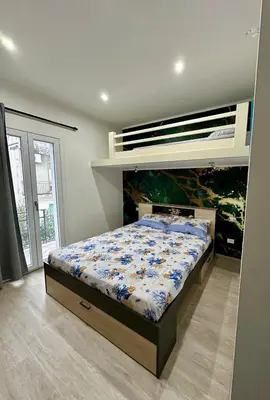 Letto o letti in una camera di Casa Paride