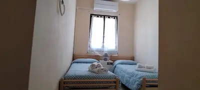 Letto o letti in una camera di Casa Clelia