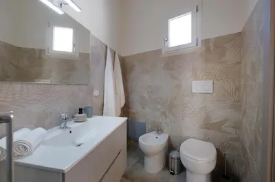 Bagno di AquaBlue affittacamere by Teuladaapartments