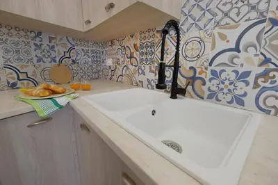 Planimetria di AquaBlue affittacamere by Teuladaapartments