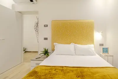 Letto o letti in una camera di Artis Rooms Guesthouse