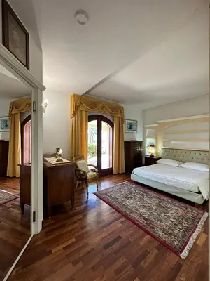 Letto o letti in una camera di Villa Basoru