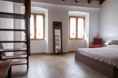 Letto o letti in una camera di Domu Mena - Domusnovas