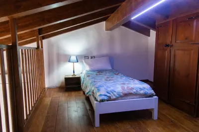 Letto o letti in una camera di Domu Mena - Domusnovas