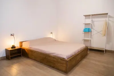 Letto o letti in una camera di Domu Mena - Domusnovas