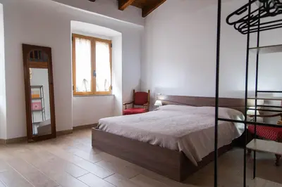 Letto o letti in una camera di Domu Mena - Domusnovas