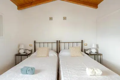 Letto o letti in una camera di VILLA WITH GARDEN, San Sperate