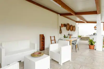 Area soggiorno di VILLA WITH GARDEN, San Sperate