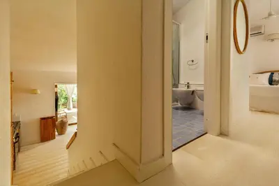Letto o letti in una camera di Blue Bay Home a pochi passi dalla baia di Porto Luna