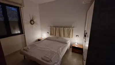 Letto o letti in una camera di Casa Congiu
