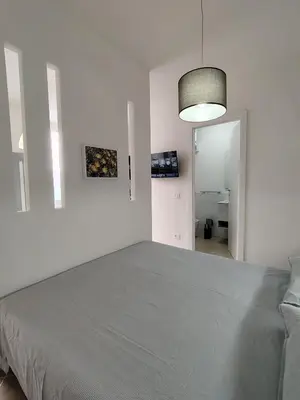 Letto o letti in una camera di Casa Fiorenza - Da e Nònne