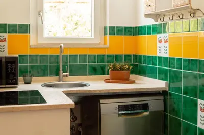 Cucina o angolo cottura di Casa Bianca - Charme e relax tra Villasimius e Notteri