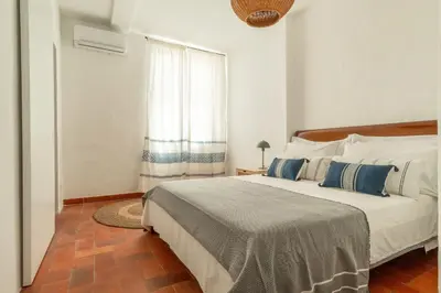 Letto o letti in una camera di Casa Bianca - Charme e relax tra Villasimius e Notteri