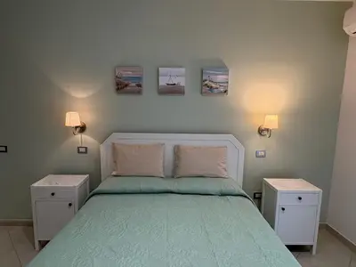 Letto o letti in una camera di Casa vacanze Caterina
