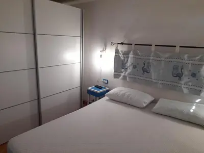 Letto o letti in una camera di Casa vacanze in pineta vista mare