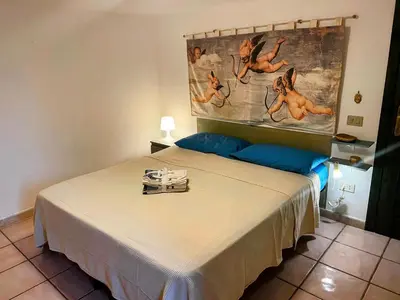 Letto o letti in una camera di Casa Margot Costa Verde Sardinia