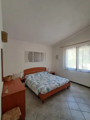 Letto o letti in una camera di Sa Domu